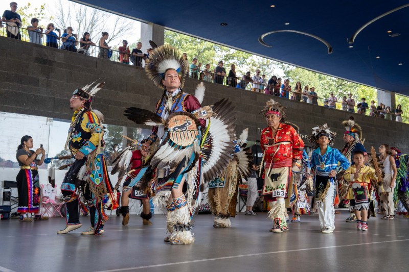 Dancers in full regalia at the Prospect Park Pow Wow at LeFrak Center at Lakeside