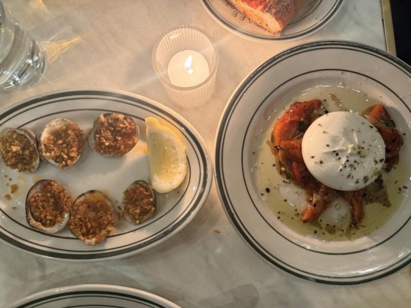 Burrata and baked clams on the table at Cafe Spaghetti on Union Street