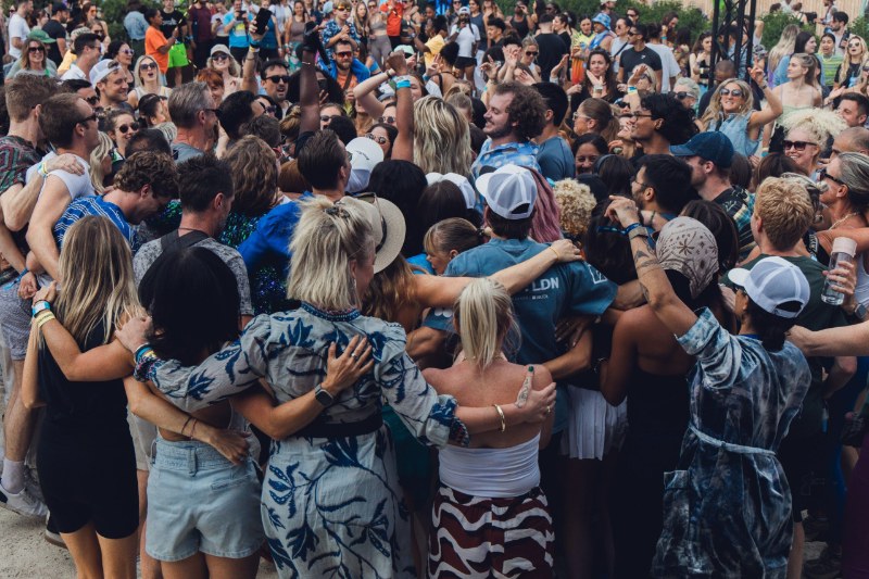 Crowd dancing at a Daybreaker ALIVE sober festival